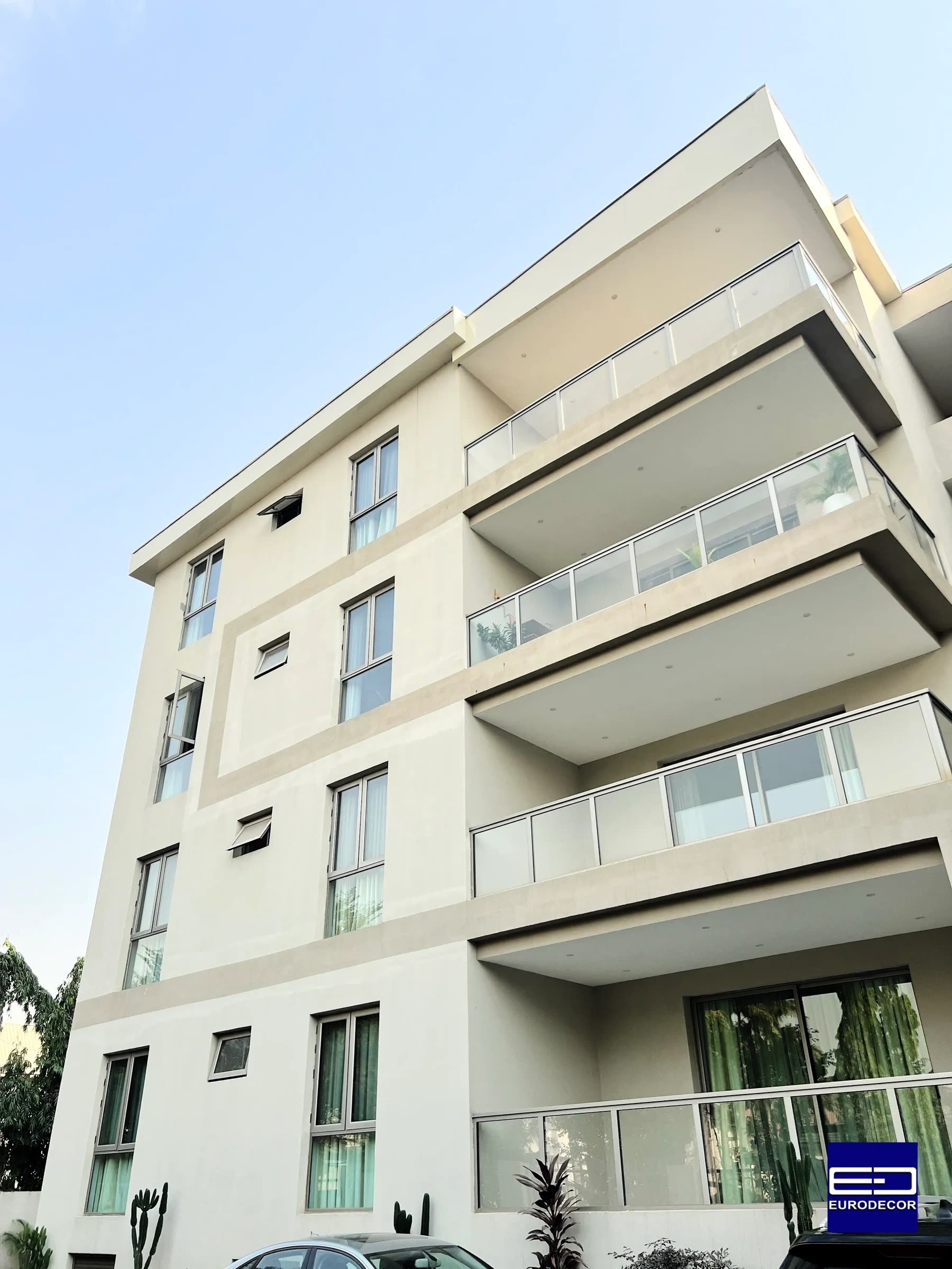 Apartment block with glass balcony handrails